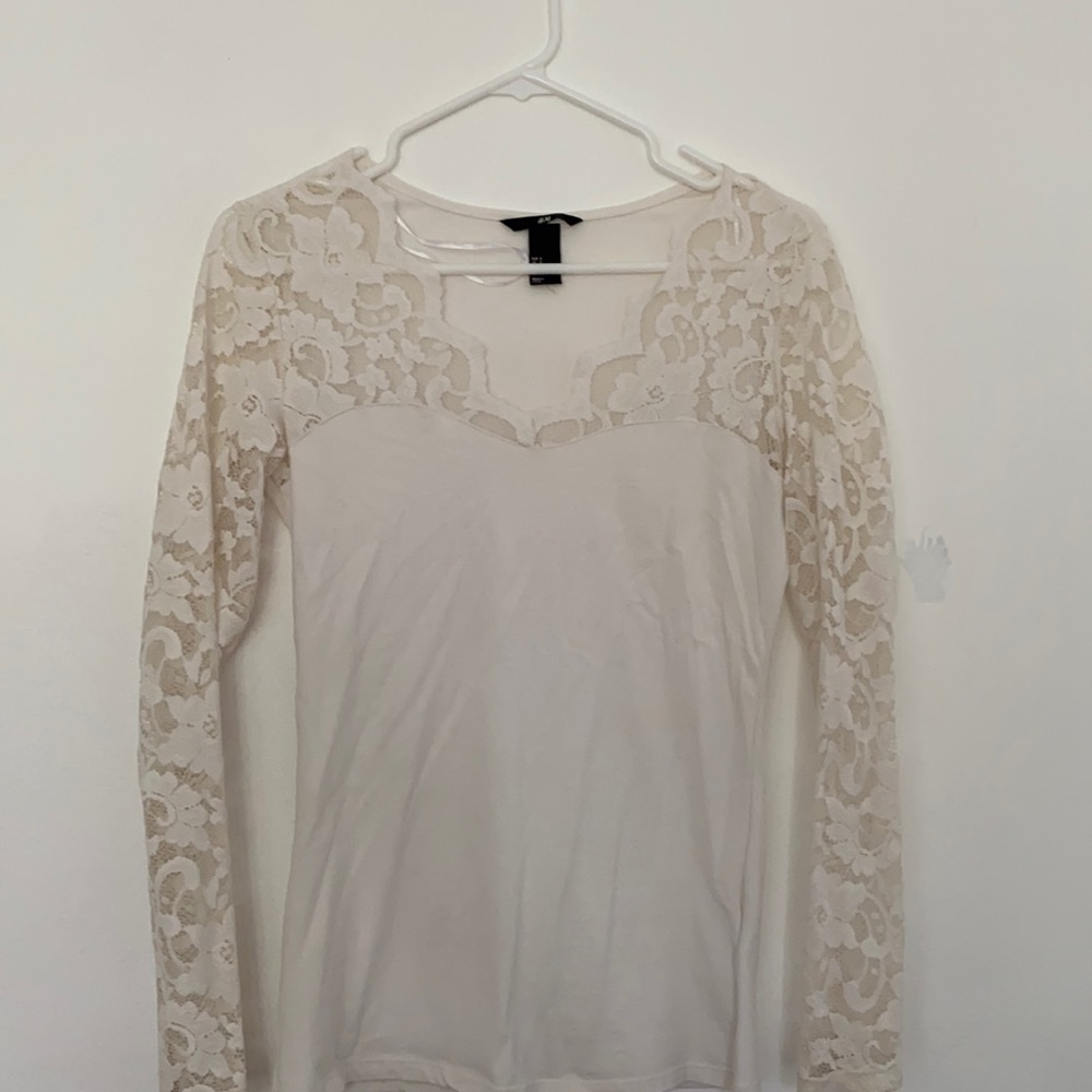 H&M shirt, cute cut in the front and fancy sleeves